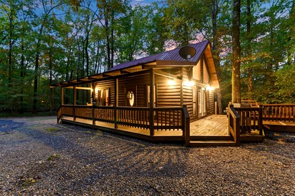 Romantic 1-Bedroom Cabin with Fireplace, Hot Tub & Nature Views Near Broken Bow - glamping.directory