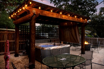 Pet Friendly, Rustic Cottage with Hot Tub and Charming Backyard, Perfect for a Weekend Escape from Austin, Texas - Fredericksburg, Texas - glamping.directory