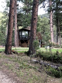 Unique Geodesic Dome Cabin with Incredible Views from the Beautiful Deck Nestled in the Trees of the Black Hills of South Dakota - Lead, South Dakota - glamping.directory