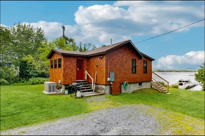 Peaceful Waterfront Retreat with Deck, Kayaks & Fire Pit in Greenville, Maine - glamping.directory