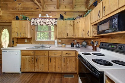 Wooden Secluded Cabin with Jacuzzi and Pool Table in Tennessee - Sevierville, Tennessee - glamping.directory