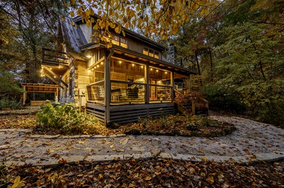 Impressive Log Cabin with Fireplace, Fire Pit and Hot-tub in Unionville, Indiana - glamping.directory