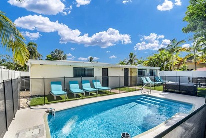 Stylish Surf-Themed Beach House with Private Pool Near Pompano Beach Pier, Pompano Beach Florida - Pompano Beach, Florida - glamping.directory