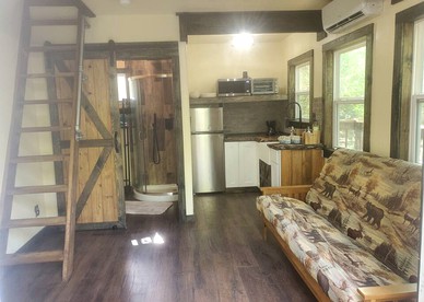 Fun for All Ages: Treehouse with Waterfront Deck for Families in Grimes County, TX - Grimes County, Texas - glamping.directory