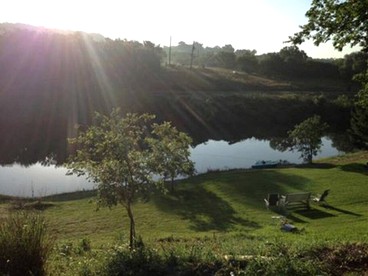 Waterfront Cabin Rental for Groups of 16 with Jacuzzi Bathtub in Texas Hill Country - Marble Falls, Texas - glamping.directory