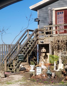 Romantic Open-Concept Couples Suite with Private Jacuzzi & Balcony Views in Bacliff, Texas - glamping.directory