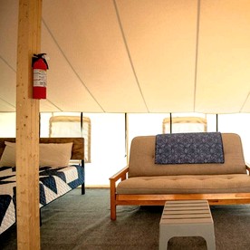 Sensational Tented Cabin Nestled Amidst Trees and Fire Pit Provided in Logan, Ohio - Logan, Ohio - glamping.directory