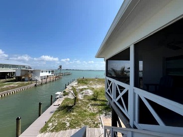 Gorgeous Waterfront Cottage with Private Dock and Incredible Bay Views for an Amazing Getaway in Placida, Florida - Placida, Florida - glamping.directory