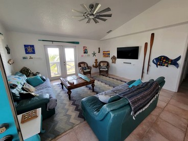Gorgeous Waterfront Cottage with Private Dock and Incredible Bay Views for an Amazing Getaway in Placida, Florida - Placida, Florida - glamping.directory