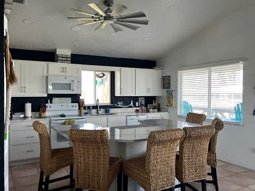 Gorgeous Waterfront Cottage with Private Dock and Incredible Bay Views for an Amazing Getaway in Placida, Florida - Placida, Florida - glamping.directory