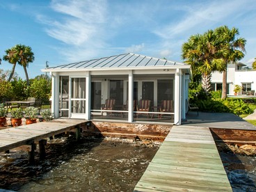 Waterfront Cottage Rental with a Heated Pool on the Indian River in Florida - glamping.directory