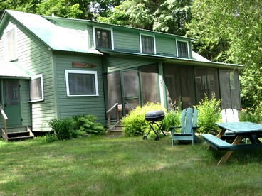Secluded Group Rental in the Woods with Stone Fireplace near Plattsburgh, New York - glamping.directory