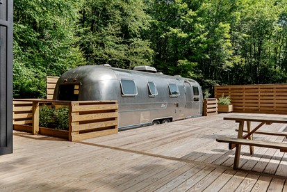 Vintage Airstream Retreat with Private Deck & Outdoor Shower in Delancey, New York - glamping.directory