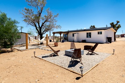 Delightful Cabin with Incredible Interior and Exterior Living Spaces in Landers, California - glamping.directory