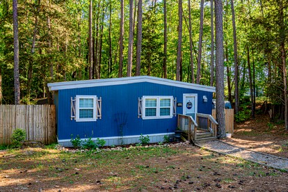 Charming Lakefront Tiny Home with Fire Pit, Grill, and Bocce Ball Near Littleton, North Carolina - glamping.directory