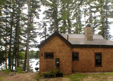 Rustic Lakefront Cabin Rental with Dock on Bauneg Beg Lake near Portland, Maine - glamping.directory