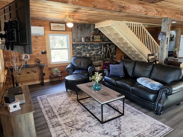 Quiet Waterfront Cabin with Fireplace, Porch & Nature All Around in Greenville, Maine - Greenville, Maine - glamping.directory