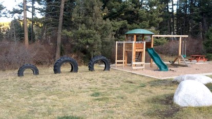 Rustic Conestoga Wagon Stay with Lodge Amenities near Boulder Creek, Montana - Hall, Montana - glamping.directory