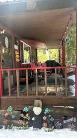 Peaceful Creekside Cabin with Fire Pit & Scenic Deck in Cascade, Idaho - Cascade, Idaho - glamping.directory