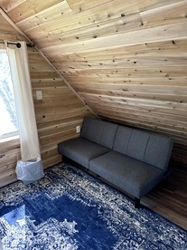 Magnificent Cabin Nestled Amidst Trees in Portage Lake, Maine - Portage Lake, Maine - glamping.directory