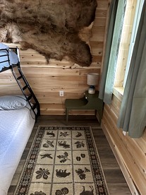 Magnificent Cabin Nestled Amidst Trees in Portage Lake, Maine - Portage Lake, Maine - glamping.directory