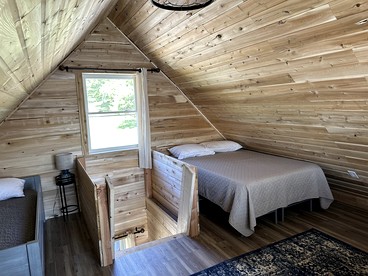 Magnificent Cabin Nestled Amidst Trees in Portage Lake, Maine - Portage Lake, Maine - glamping.directory