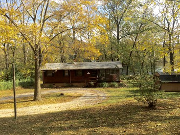 Riverfront Cabin with Four-Person Hot Tub in Shenandoah Valley, Virginia - Luray, Virginia - glamping.directory