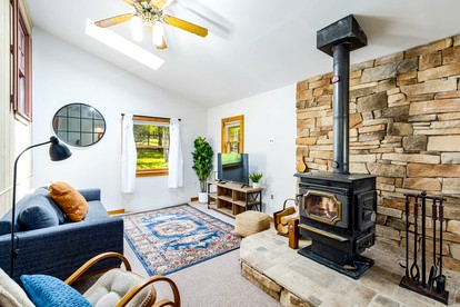 Cozy River Access Cabin with Hot Tub, Fire Pit and Deck Near Great Cacapon State Park in Bloomery, WV - Bloomery, West Virginia - glamping.directory