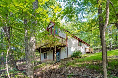 Mountainside Chalet-Cabin with Hot Tub, Large Deck, Fire Pit and Grill - Everything You Need for Your Gerrardstown, WV Getaway - glamping.directory