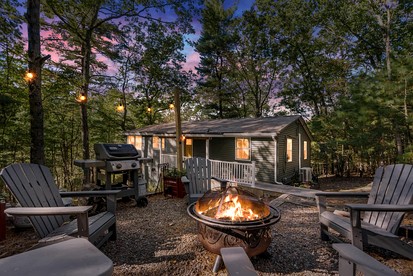 Cozy Modern Cabin with Fire Pit & Trail Access near Berkeley Springs, West Virginia - glamping.directory
