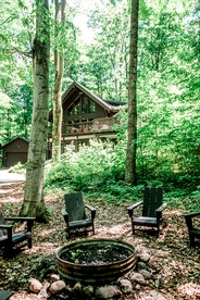 Incredible Cottage with Private Beach and Indoor and Outdoor Swimming Pool in Bellaire, Michigan - glamping.directory