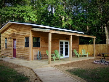 Rustic Creekside Cabin Rental with a Private Dock near the Georgia Coast - glamping.directory