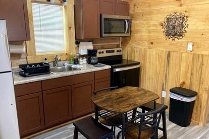Quaint Cabin with Lofted Interior, Spa and BBQ in Indiana - Birdseye, Indiana - glamping.directory