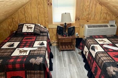 Quaint Cabin with Lofted Interior, Spa and BBQ in Indiana - Birdseye, Indiana - glamping.directory