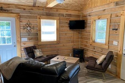 Quaint Cabin with Lofted Interior, Spa and BBQ in Indiana - Birdseye, Indiana - glamping.directory