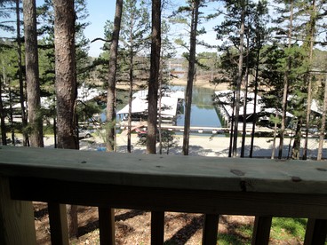 Idyllic Lakefront Log Cabin with Hot Tub and Boat Dock on Lake Ouachita Marina in Mount Ida, Arkansas - Mount Ida, Arkansas - glamping.directory