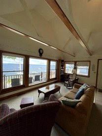 Cozy Lake Front Cabin with Private Beach Access and Stunning Views of Sebago Lake in Frye Island, Maine - Standish, Maine - glamping.directory