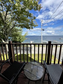 Cozy Lake Front Cabin with Private Beach Access and Stunning Views of Sebago Lake in Frye Island, Maine - Standish, Maine - glamping.directory