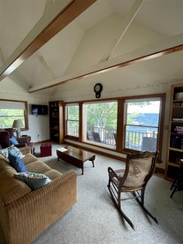 Cozy Lake Front Cabin with Private Beach Access and Stunning Views of Sebago Lake in Frye Island, Maine - Standish, Maine - glamping.directory
