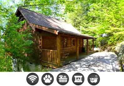 Pet-Friendly Cabin with Jacuzzi Fantastic for Hiking Trails in Pigeon Forge, Tennessee - glamping.directory