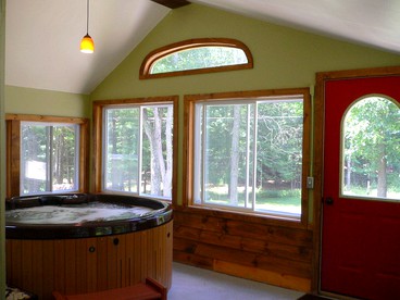 Secluded Two-Bedroom Cottage Rental with Hot Tub and Fireplace in Woodstock, New York - Saugerties, New York - glamping.directory