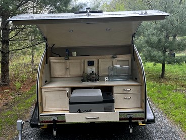 Unique Tiny Teardrop Camper for a Cozy Romantic Getaway in the Forest by the River in Jacksonville, Vermont - glamping.directory