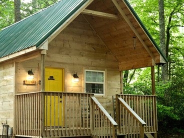 Charming Cabin in the Woods for a Cozy Outdoor Experience Surrounded by Nature in Cosby, Tennessee - glamping.directory