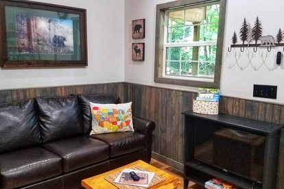 Charming Cabin in the Woods for a Cozy Outdoor Experience Surrounded by Nature in Cosby, Tennessee - Cosby, Tennessee - glamping.directory