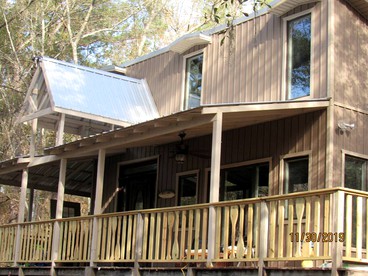 Georgia's Coziest Riverside Retreat: Cabin Adventure in Claxton - glamping.directory