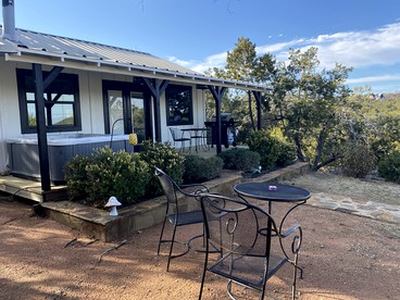 The Ultimate Romantic Getaway: Charming Cabin with a Hot Tub in Wimberley, Texas - glamping.directory