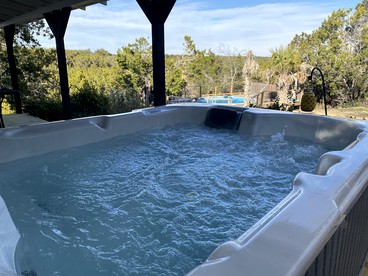 The Ultimate Romantic Getaway: Charming Cabin with a Hot Tub in Wimberley, Texas - Wimberley, Texas - glamping.directory