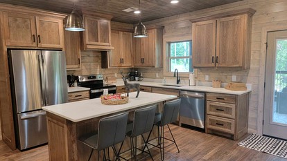 Elegant Cabin with a Hot Tub in Broken Bow, OK - The Ultimate Glamping Spot - Broken Bow, Oklahoma - glamping.directory