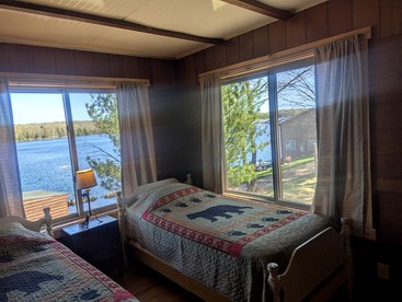 Rustic Two-Story Cabin Rental with Lake Access in Hayward, Wisconsin - Hayward, Wisconsin - glamping.directory