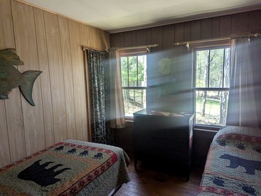 Rustic Two-Story Cabin Rental with Lake Access in Hayward, Wisconsin - Hayward, Wisconsin - glamping.directory